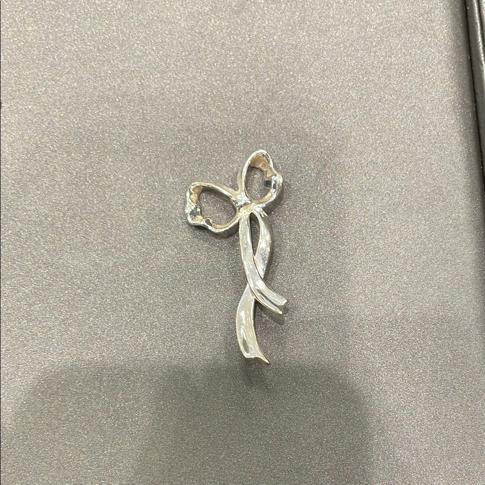 Elegant Silver Bow Brooch